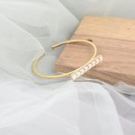 Sleek Arrow Enamel Bar Motif Gold Cuff Bangle