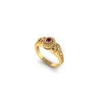 Lucky Charm Ring adorned with Ruby and Diamond Gold Ring